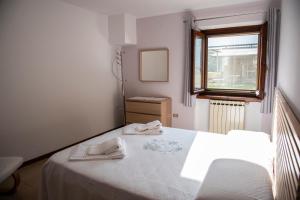 Postel nebo postele na pokoji v ubytování Cascina Pirondini