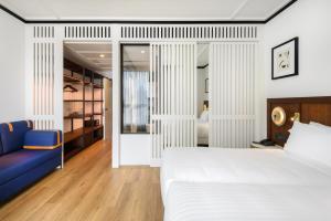 Postel nebo postele na pokoji v ubytování Hotel Tres Reyes San Sebastián