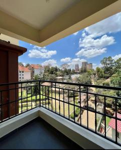 a balcony with a view of the city at Paradise palace in Nairobi