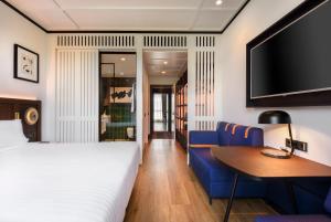 Postel nebo postele na pokoji v ubytování Hotel Tres Reyes San Sebastián