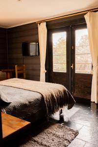 Letto o letti in una camera di Newen B&B