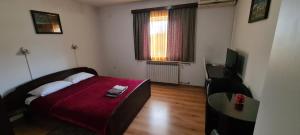 Posteľ alebo postele v izbe v ubytovaní Guesthouse Kod mosta