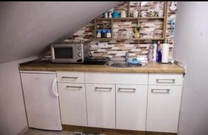 مطبخ أو مطبخ صغير في Apartman Marija