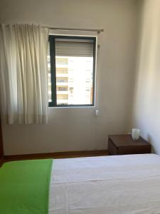 En eller flere senge i et værelse på Apartamento Mira Rocha