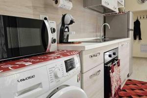 Een keuken of kitchenette bij Scala Paradiso ~ B&B Molfetta