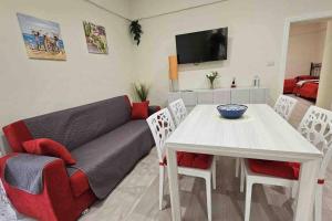 Een TV en/of entertainmentcenter bij Scala Paradiso ~ B&B Molfetta
