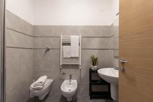 Koupelna v ubytování Tuscasì Aparthotel
