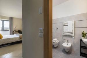 Ванная комната в Tuscasì Aparthotel