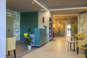 Posezení v ubytování Tuscasì Aparthotel