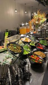 a buffet with many bowls of food on a table at Golden New Al Safa in Jeddah