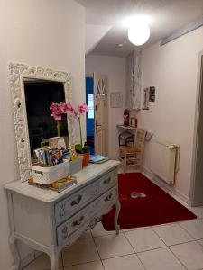 Część wypoczynkowa w obiekcie Appartement spacieux à Ingersheim avec vue sur jardin, 100 m²
