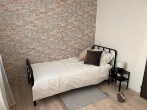 Postel nebo postele na pokoji v ubytování Stella Apartment