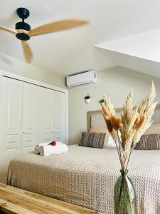 Letto o letti in una camera di Escale Caraïbes