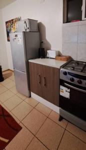 Dapur atau dapur kecil di Cómodo departamento full equipado en Coyhaique