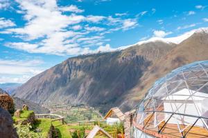 a view of a mountain with a dome and a valley at Stardome Spiritual Experience in Ollantaytambo