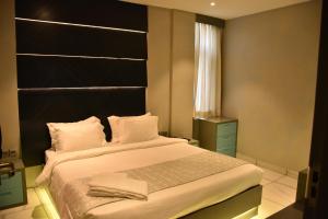 Postel nebo postele na pokoji v ubytování NT Hotels and Resorts Akridha