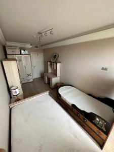 Voodi või voodid majutusasutuse Luxury apartment in Skopje toas