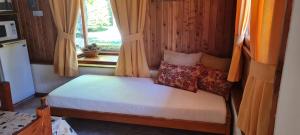 Postel nebo postele na pokoji v ubytování cabañas el águila