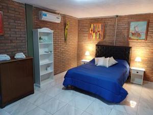 En eller flere senge i et værelse på Costa Dorada + 8 billeder