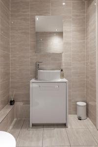 Koupelna v ubytování 2 Bed town house with Garden in Hackney, London + 57 fotografií
