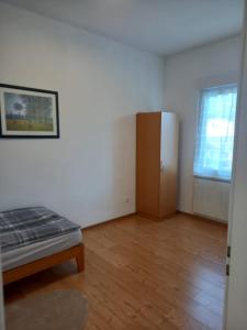 Ein Bett oder Betten in einem Zimmer der Unterkunft Schöne Ferienwohnung in Gernsbach