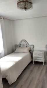 Ein Bett oder Betten in einem Zimmer der Unterkunft La casita de Soria