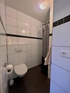 Vannituba majutusasutuses Guesthouse Nypugardar