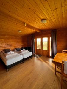 Voodi või voodid majutusasutuse Guesthouse Nypugardar toas