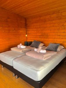 Voodi või voodid majutusasutuse Guesthouse Nypugardar toas