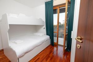 Postel nebo postele na pokoji v ubytování Apartment Forum IV