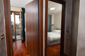 Postel nebo postele na pokoji v ubytování Apartment Forum IV