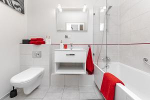 Koupelna v ubytování Aura Apartment + 27 fotografií
