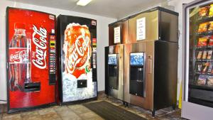 two vending machines in a store with soda machines at Motel 6 - Pensacola West in Pensacola