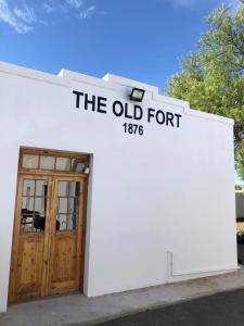 a white building with the old forft sign on it at The Old Fort in Aberdeen