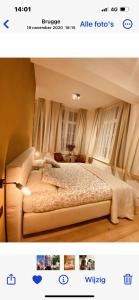 Postel nebo postele na pokoji v ubytování B&B Augusto