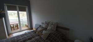 Letto o letti in una camera di Onix-Vital Apartman Orfű