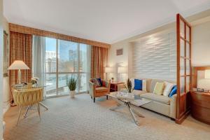 a living room with a couch and a table at Sin City Suite @ MGM Signature in Las Vegas