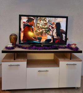 TV o dispositivi per l'intrattenimento presso Walter guest house