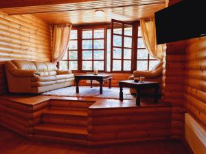 TV a/nebo společenská místnost v ubytování ''Nest'' The Wooden Suite by Ski Alure