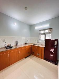 Η κουζίνα ή μικρή κουζίνα στο Vishaka Daily Rentals