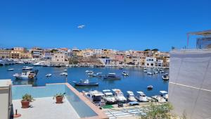 a view of a marina with boats in the water at Case Vacanze Porto Vecchio in Lampedusa
