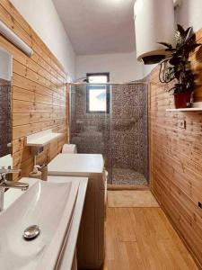 a bathroom with a shower and a sink at Zarlett House, Pazari ri ,Villa with Garden,Parking in Tirana