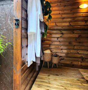 a room with wooden walls and a wooden floor at The Stable Annexe & Spa in Dogdyke