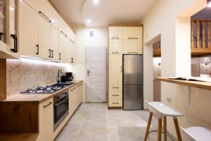Kuchyň nebo kuchyňský kout v ubytování Native Apartments Dietla 17