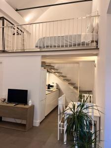 Televízia a/alebo spoločenská miestnosť v ubytovaní Loft San Diego 2