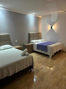 Postel nebo postele na pokoji v ubytování Pousada vista alegre
