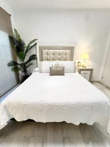 Cama ou camas em um quarto em Casa Caracol