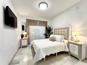 Cama ou camas em um quarto em Casa Caracol