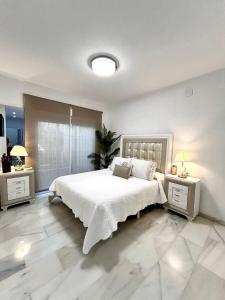 Cama ou camas em um quarto em Casa Caracol