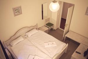 Rúm í herbergi á Hotel St.Michael